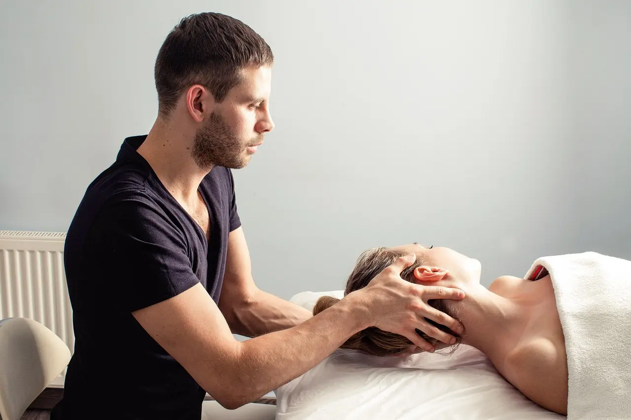 A therapist and client talking in a counseling session