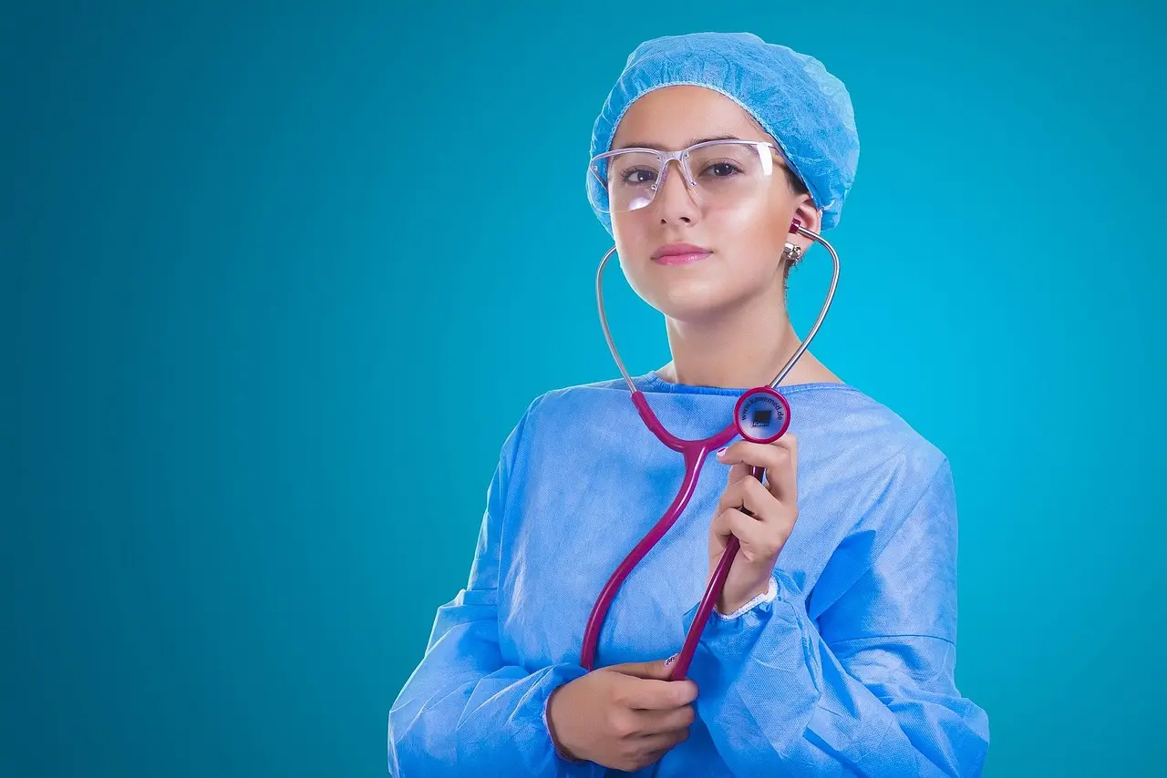 A healthcare professional meeting with a patient